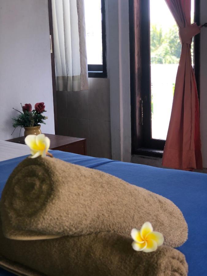 Tira Amed Homestay Bagian luar foto