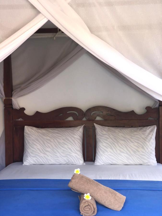 Tira Amed Homestay Bagian luar foto