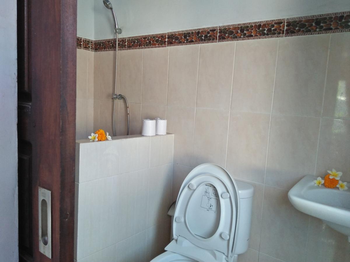 Tira Amed Homestay Bagian luar foto