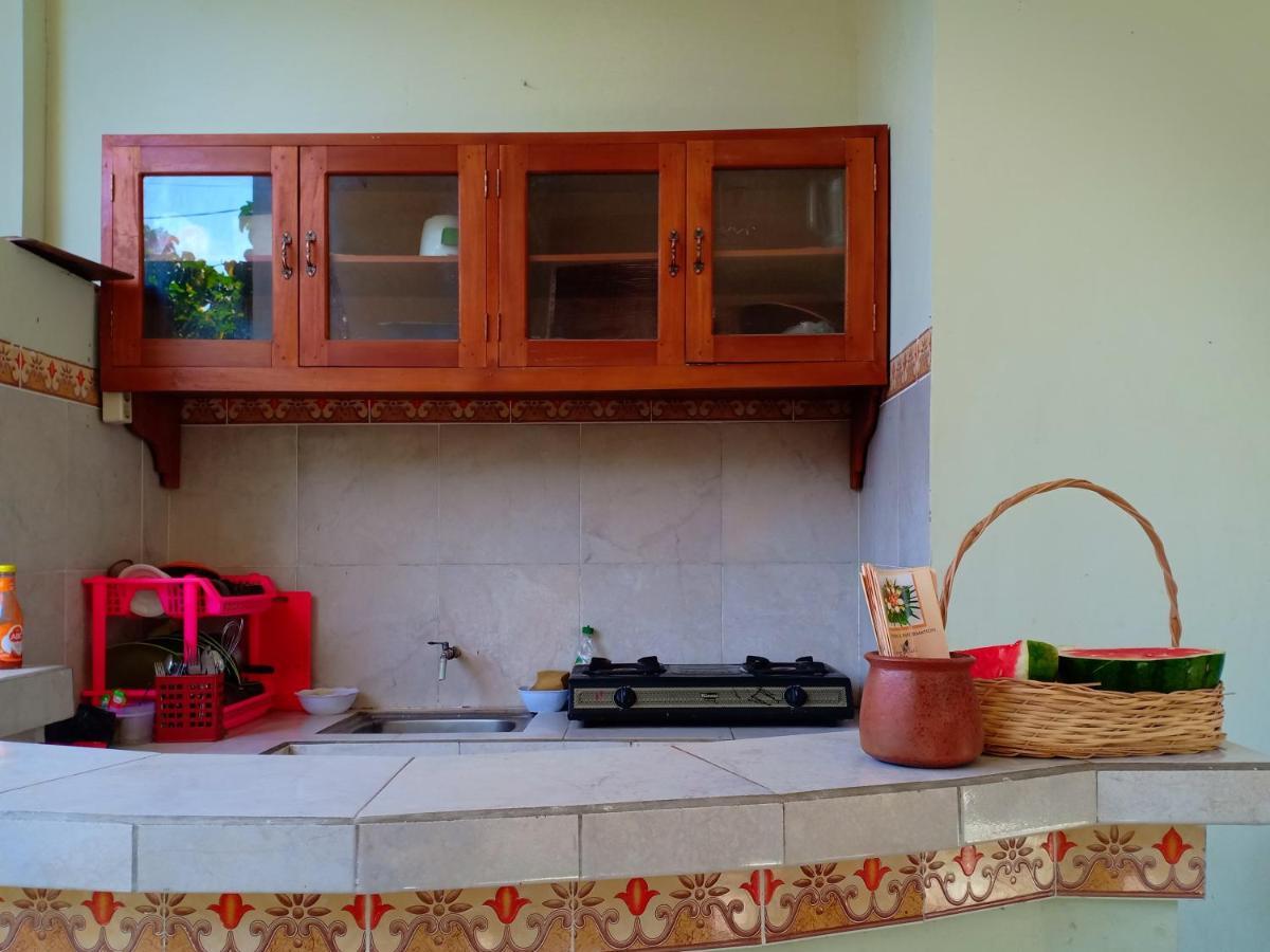 Tira Amed Homestay Bagian luar foto